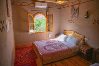 Warmly decorated local guesthouse room